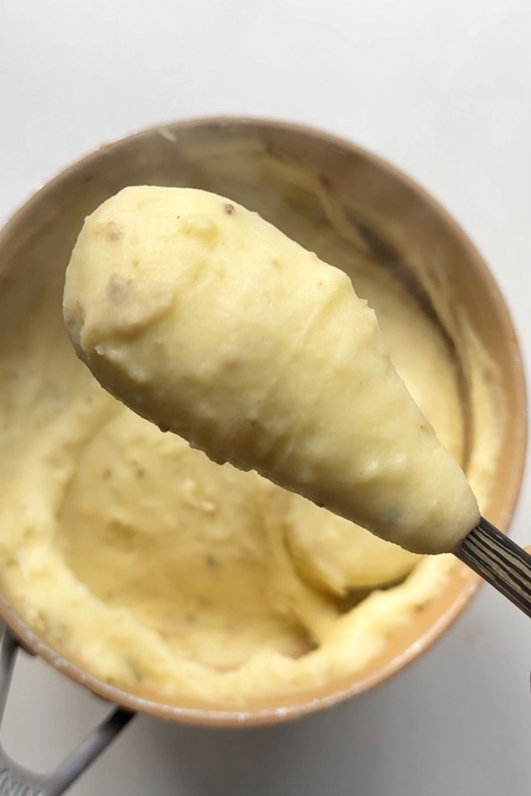 Creating mashed potato.