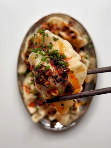 Pork and shrimp dumplings with chilli oil.