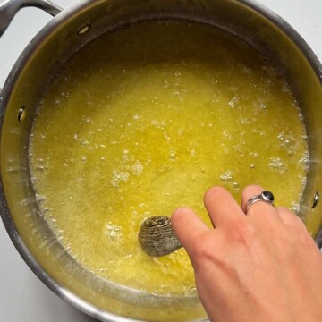 Ghee melting in a metal pot