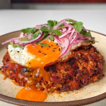 Peruvian rice and beans with an egg on top.