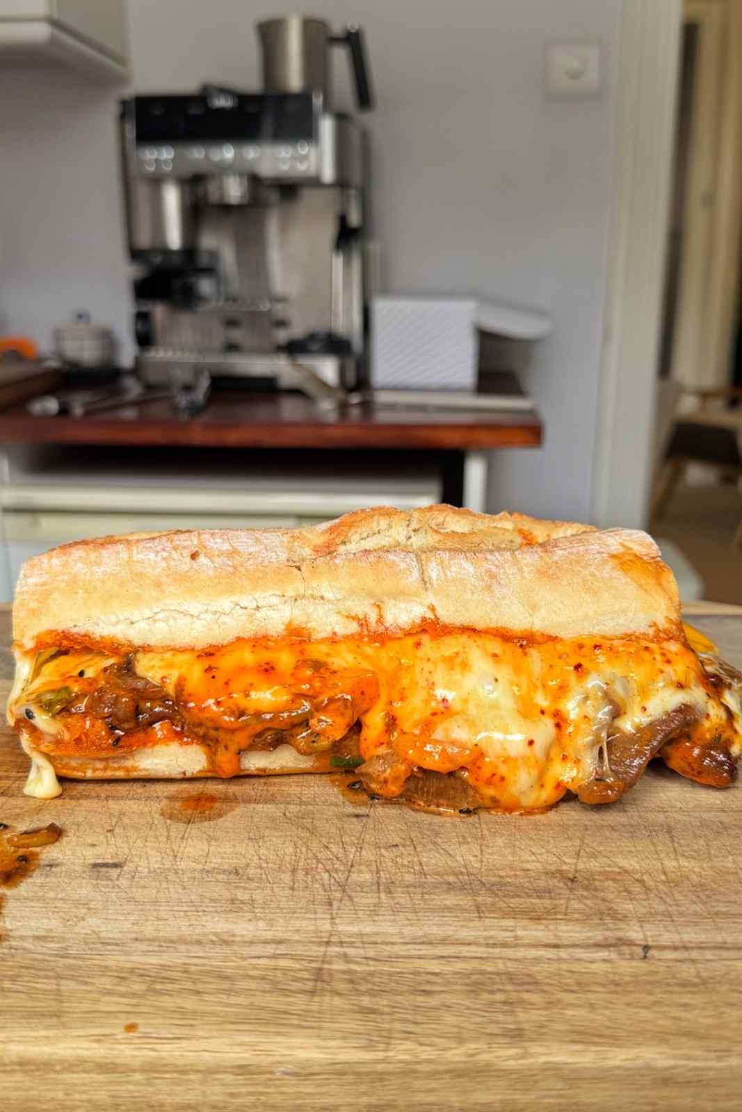 Bulgogi sandwich on a chopping board.