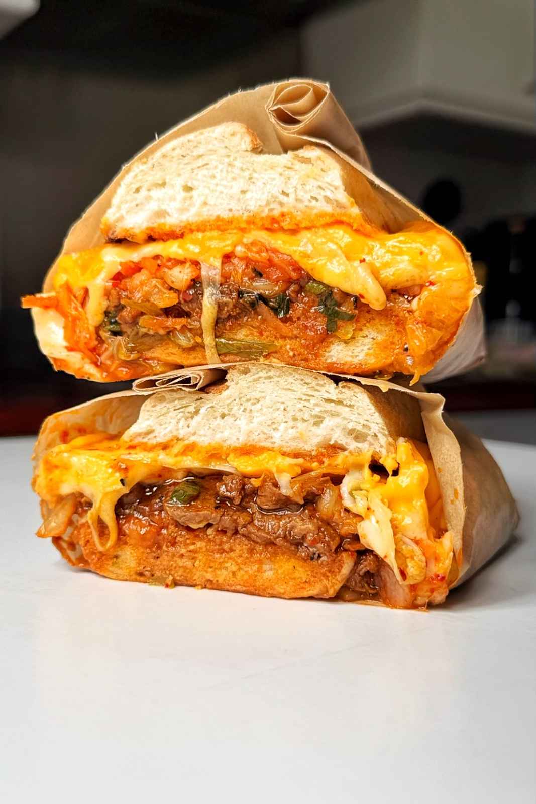 Bulgogi cheesesteak on white background.