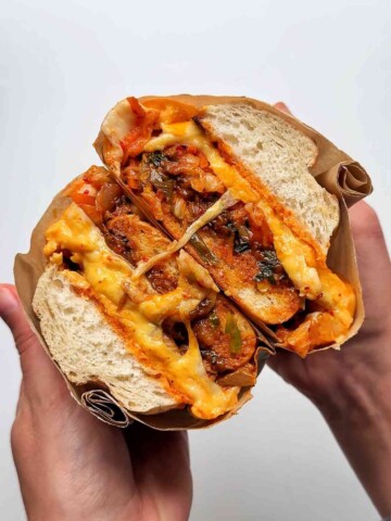 Bulgogi cheesesteak on white background.